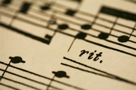 what does ritardando mean in music and how does it relate to the slowing down of time in literature?